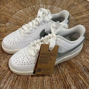 Nike Classic White Sneakers with Green Detail